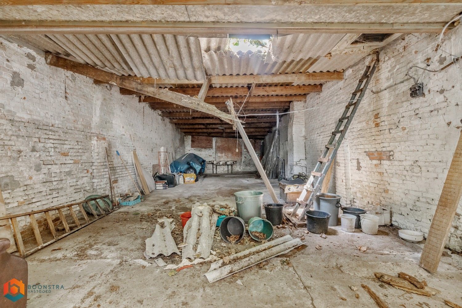 Te renoveren woning met veel potentieel in hartje Mechelen foto 24
