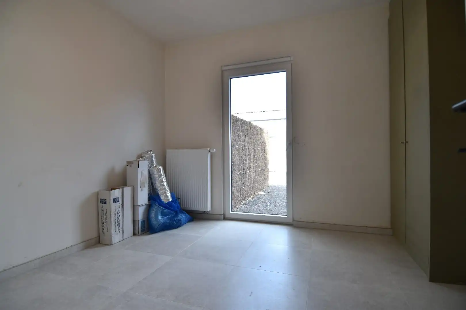 Gelijkvloers appartement te koop met 1 slaapkamer en tuinje in Helkijn foto 9