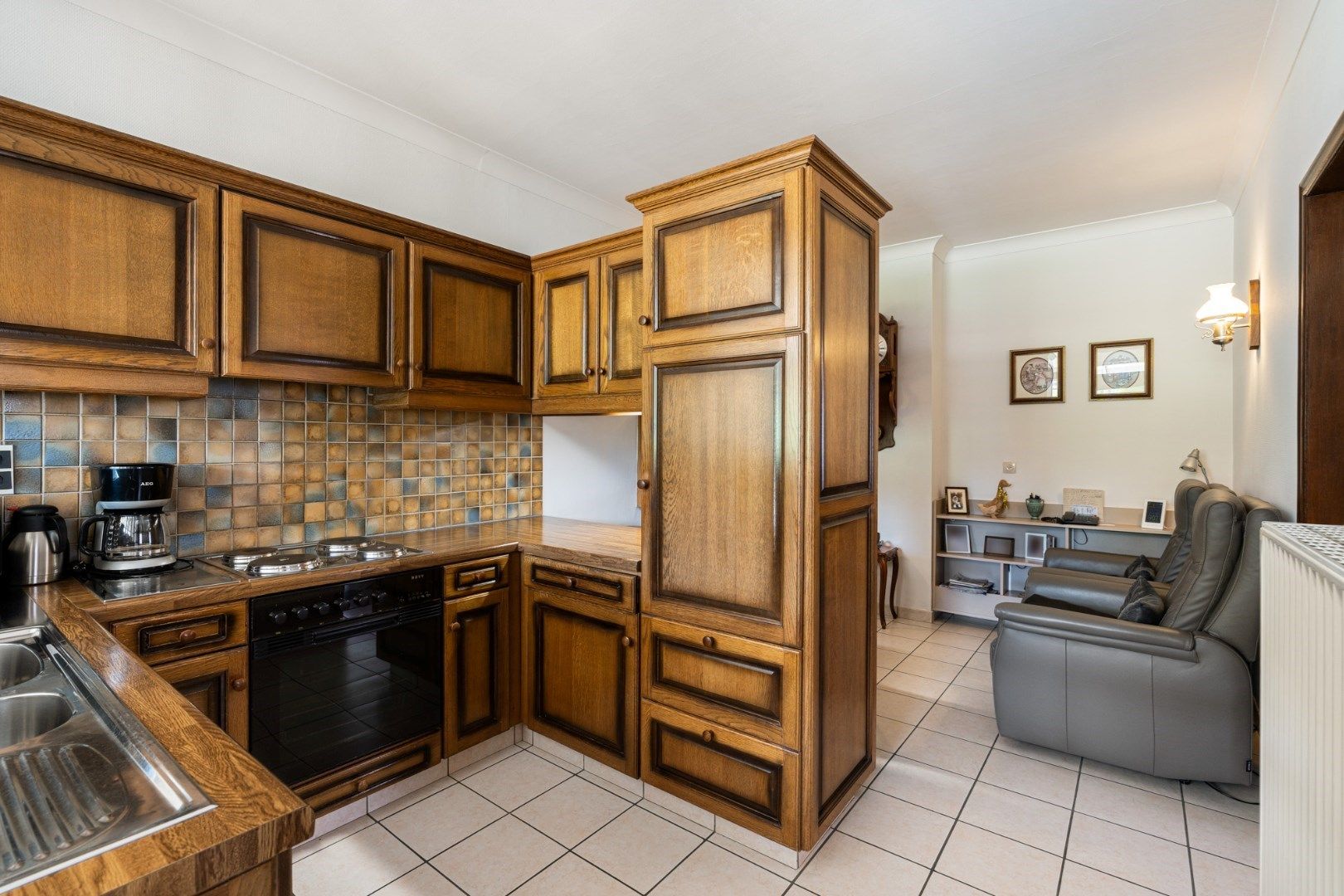 IN OPTIE - Verzorgde vrijstaande woning met mooie tuin op 11a 58ca, op enkele minuutjes van het centrum  foto 7
