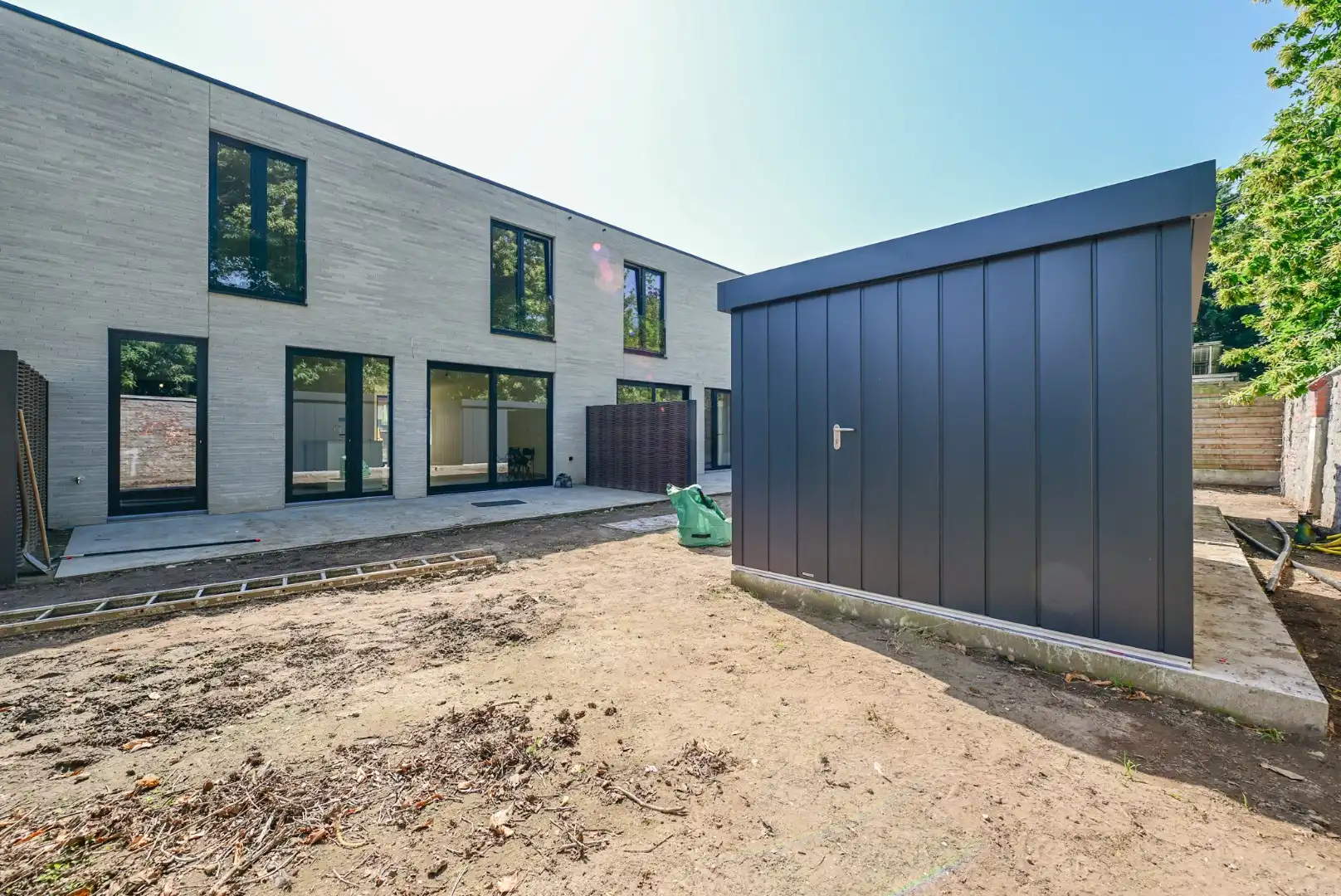Moderne energiezuinige halfopen woning met 3 slaapkamers, tuin en carport foto 7