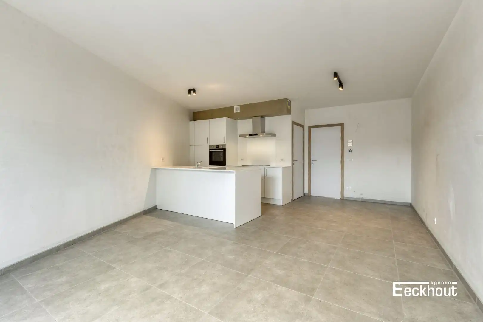 Gelijkvloersappartement met terras en tuin en inpandige garage! foto 4