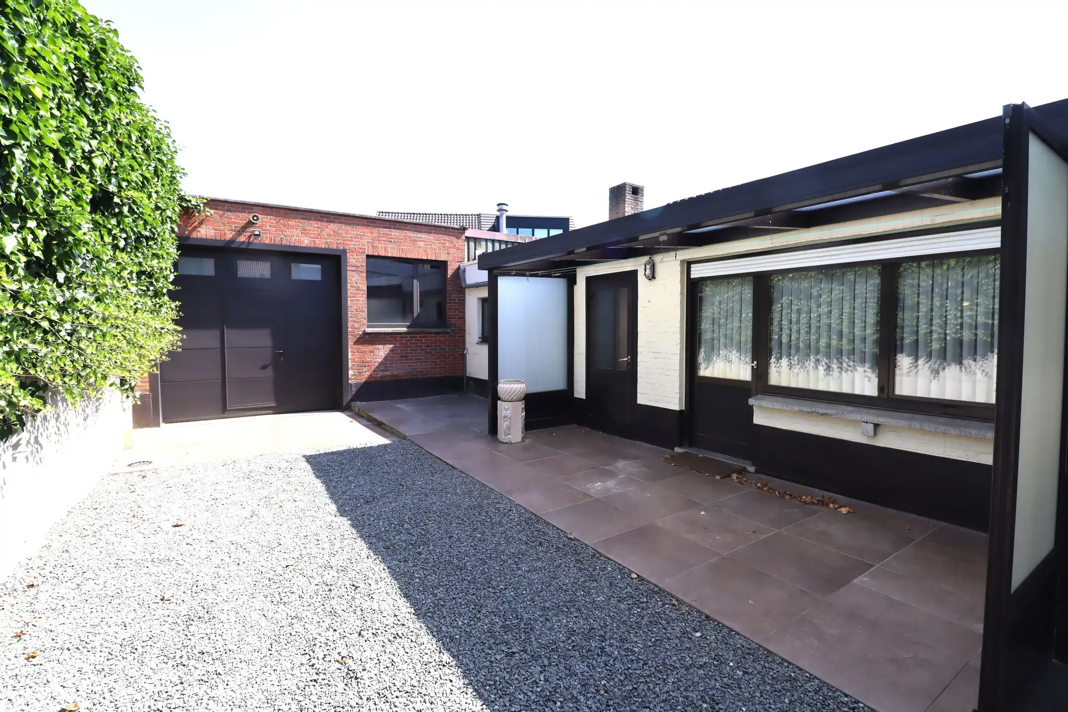 woning met loods van ca. 60 m² en ruime parkeergelegenheid in Bornem foto 4