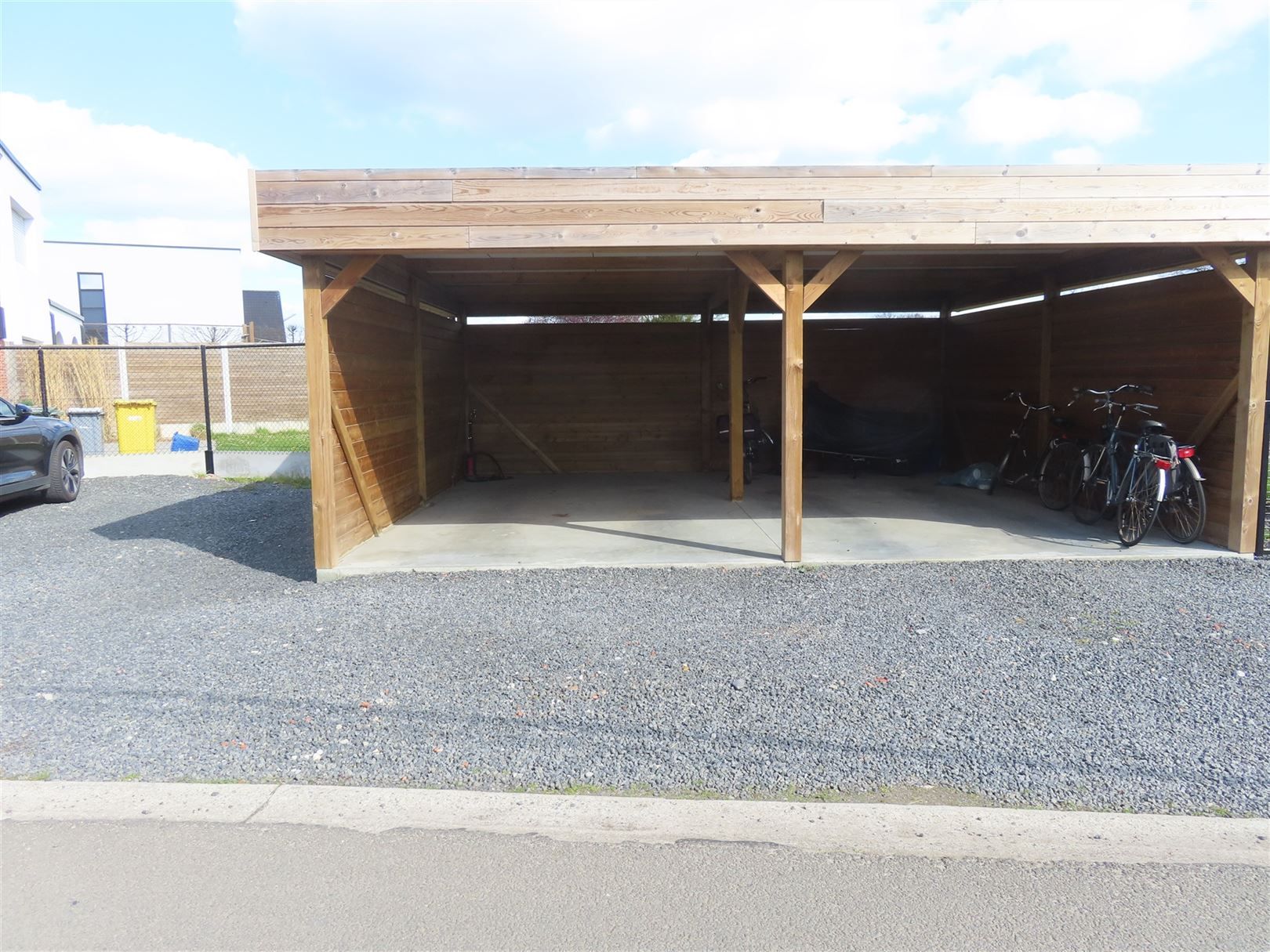 Gelijkvloers tweeslaapkamerappartement met tuin en carport! foto 15