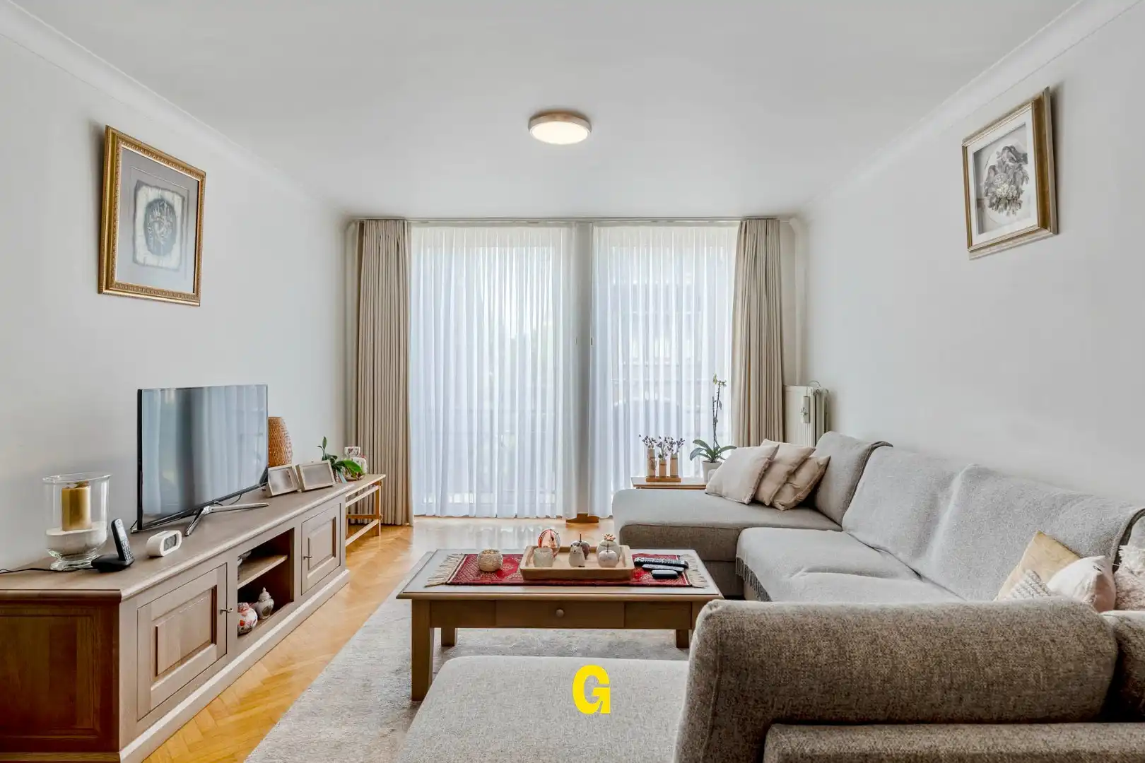 Uitstekend verzorgd 2-slaapkamer appartement in hartje Bilzen, met standplaats, kelderberging en terras met zicht op het Park van Haffmans foto 11