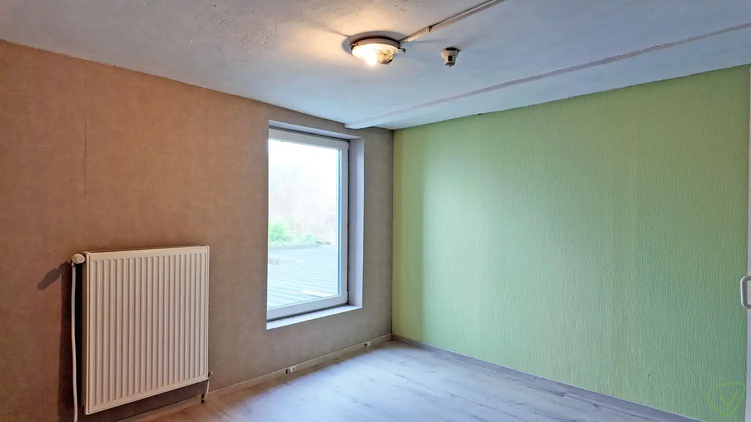 Statige woning met ruime tuin in het centrum van Kaprijke foto 16