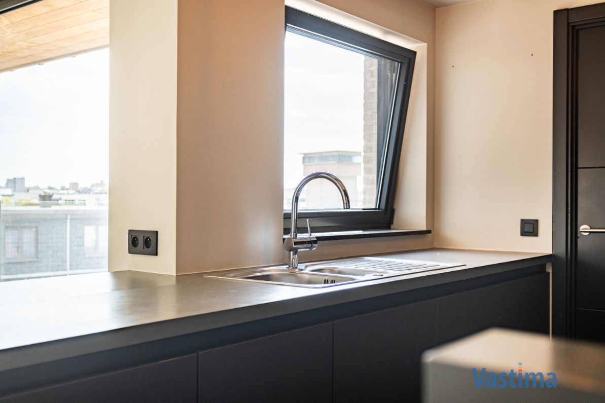 Penthouse met 2 terrassen met zicht over de skyline van Aalst foto 16