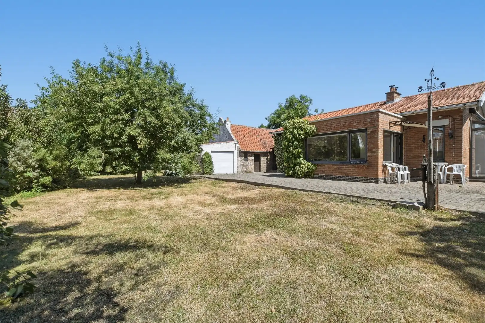 Authentieke en karaktervolle bungalow met veel mogelijkheden in Vosseslag, De Haan foto 14
