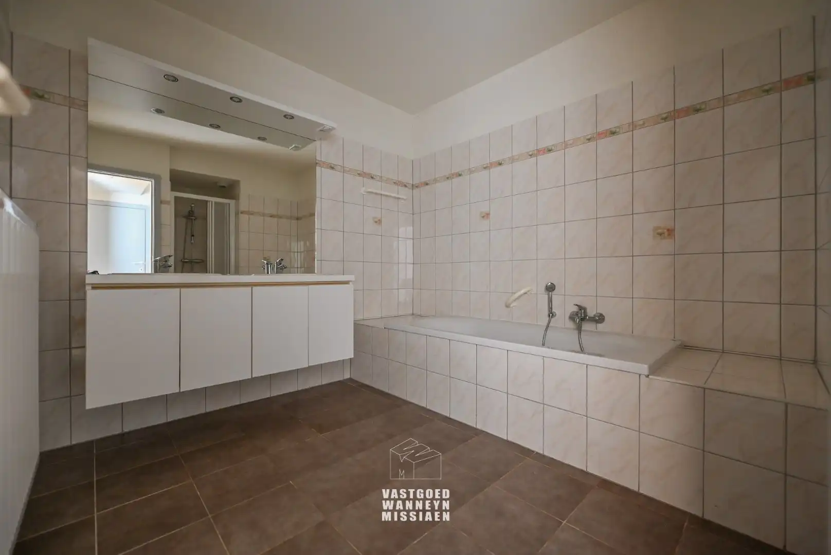 Ruim gelijkvloers appartement met 2 slpk en zonnige tuin/terras foto 16
