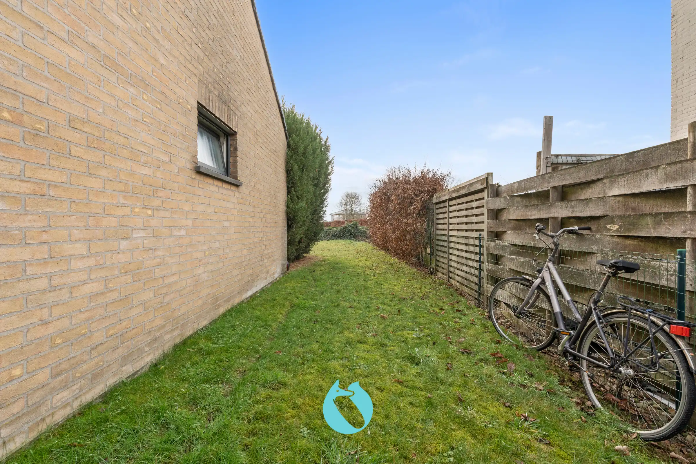 Gelijkvloers appartement met 2 slpks, tuin en garage foto 16