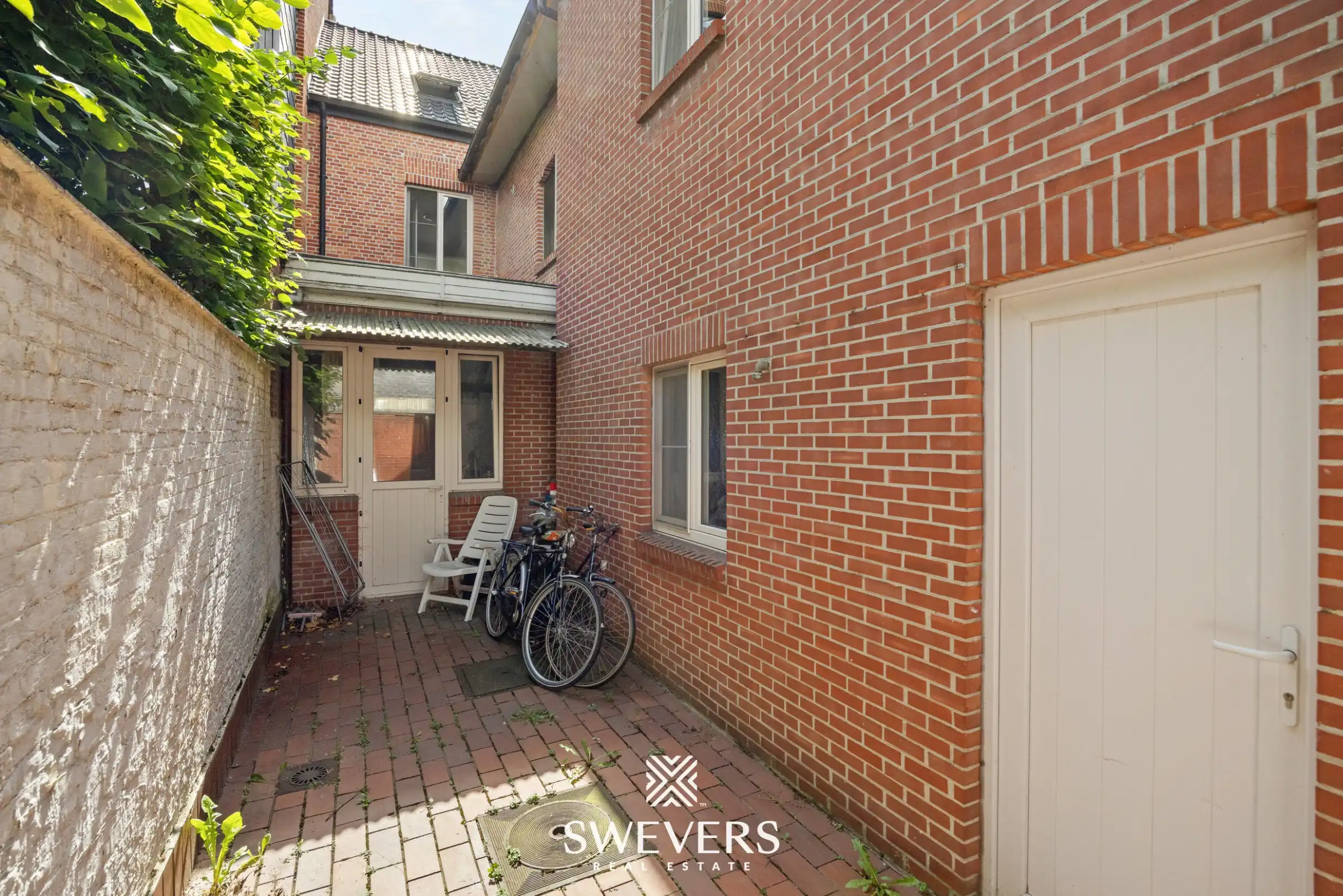 Gerenoveerd investeringspand met 2 verhuurde appartementen te Leopoldsburg foto 15