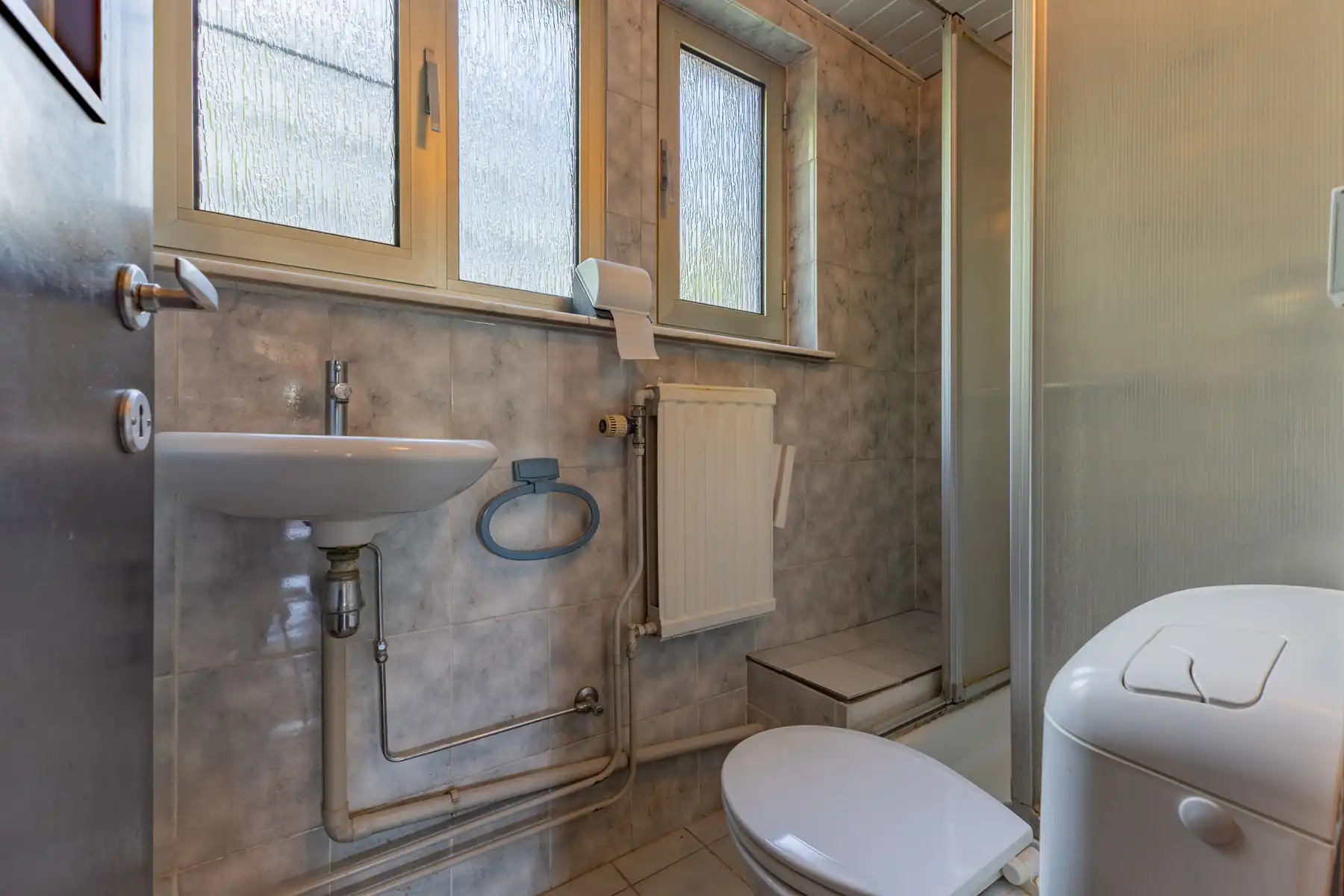 Gunstig gelegen woning met 3 slaapkamers, bureel en tuin foto 12
