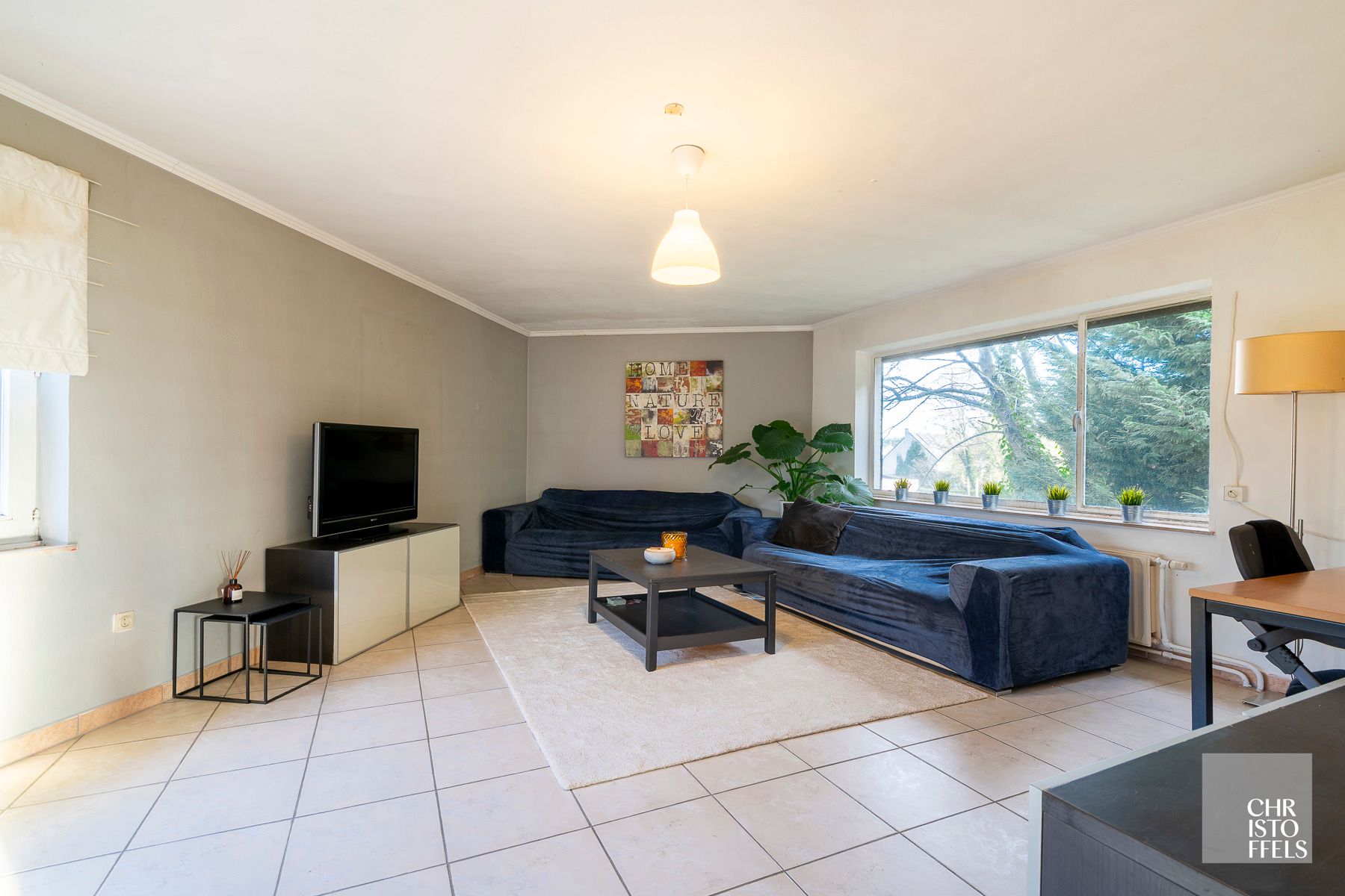 Te renoveren woning met 3 slaapkamers op ruim perceel van 1.085 m² foto 2