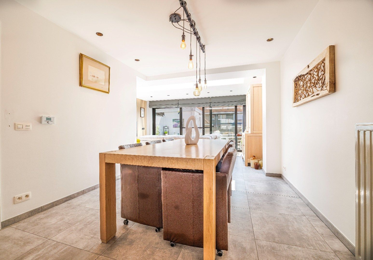 Top gerenoveerde woning met uitzonderlijke lichtinval in het hartje van Heist foto 4