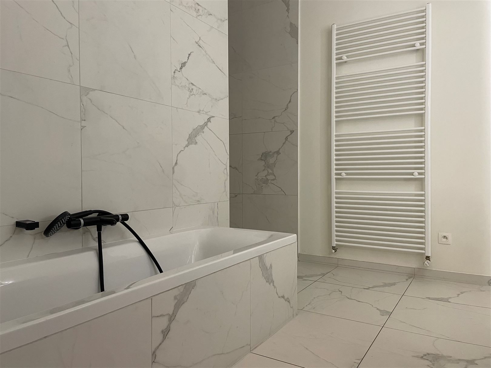 Gelijkvloers appartement met zonnig tuintje. foto 7