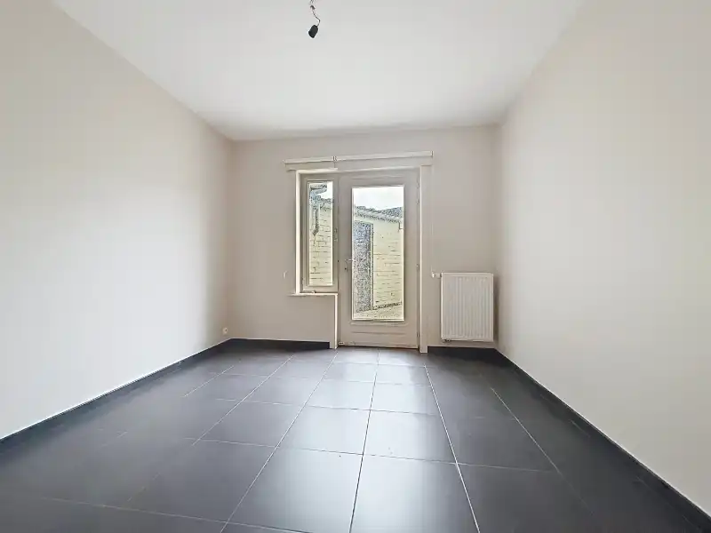 Gelijkvloers appartement met terras en dubbele garage foto 6