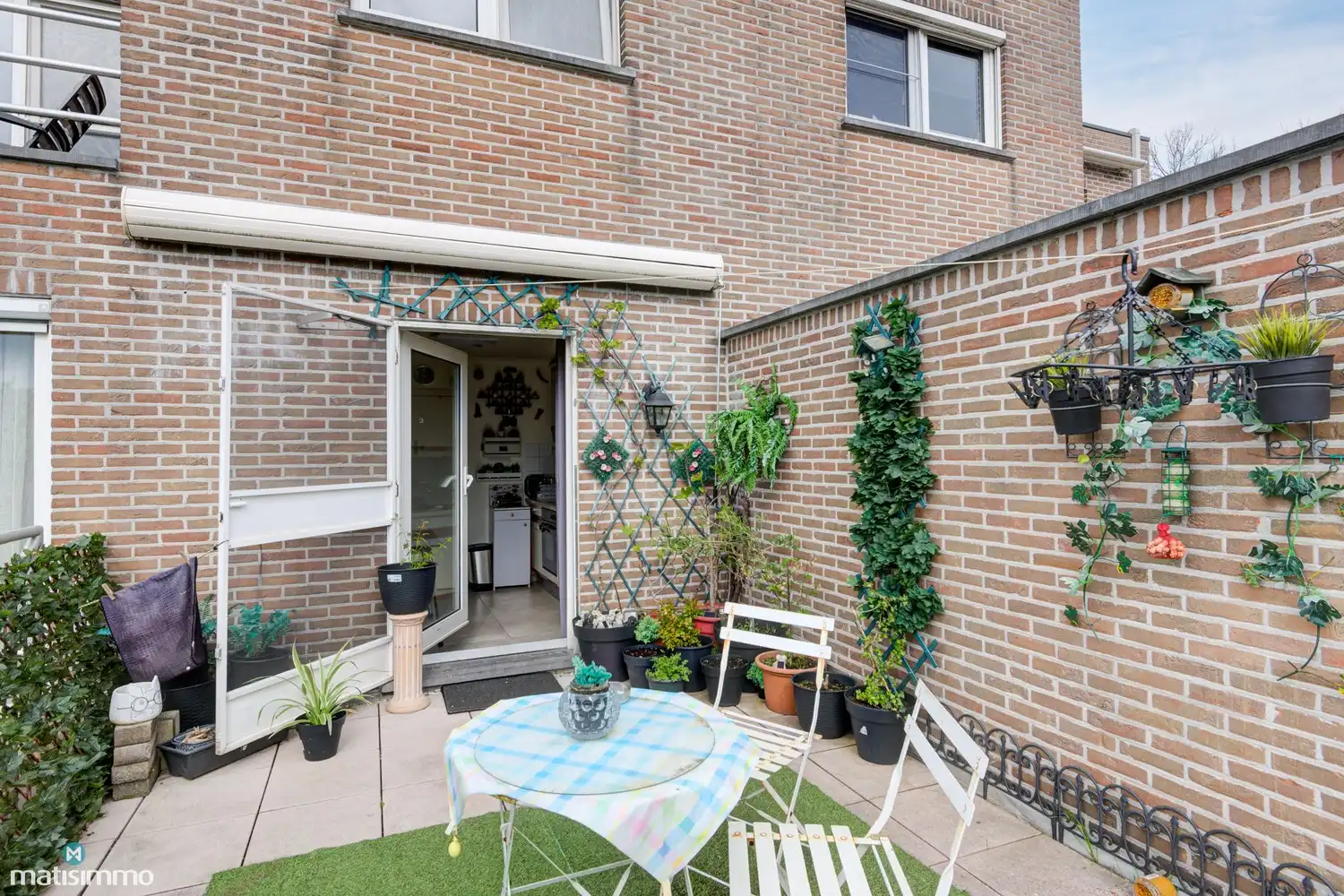 GOED ONDERHOUDEN APPARTEMENT MET GARAGE, KELDER EN RUIM ZUIDWESTGEORIËNTEERD TERRAS IN BILZEN foto 12