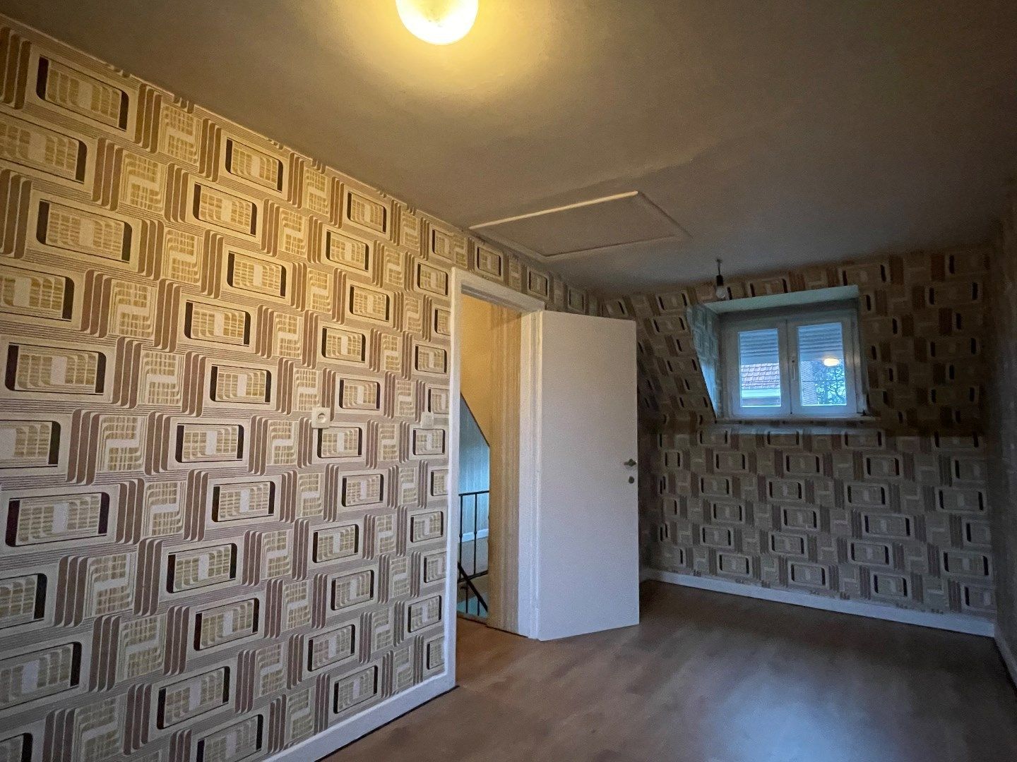 Grote woning met mogelijks 5 kamers, garage en zongerichte tuin foto 13