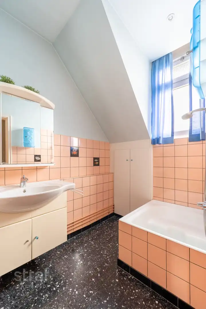 Bel-etage met drie ruime slaapkamers en een gezellige tuin foto 9