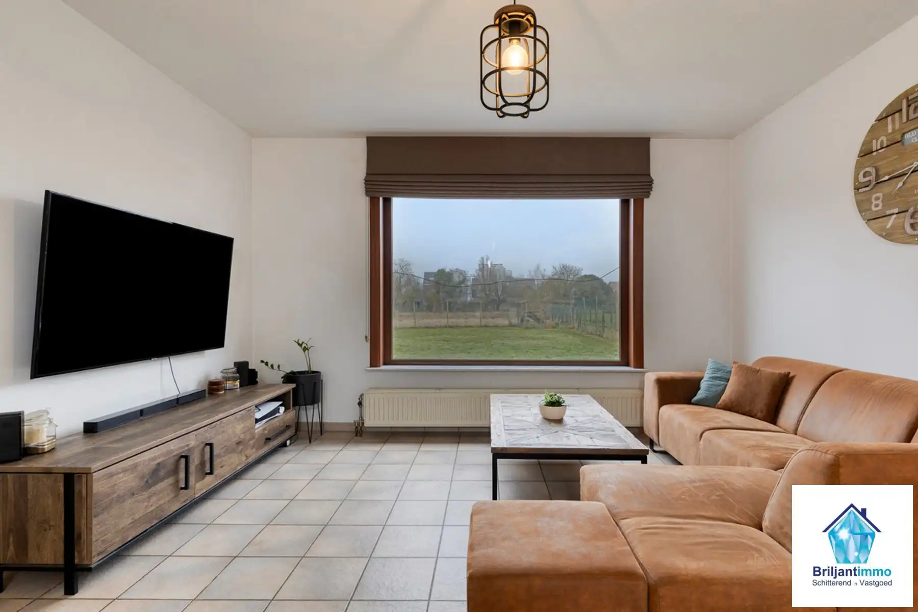 Open bebouwing met 3 slp, garage en tuin in rustige buurt foto 3