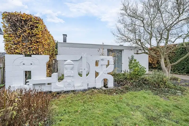 Hoofdfoto van de publicatie: Organische architecten- en kunstenaarswoning