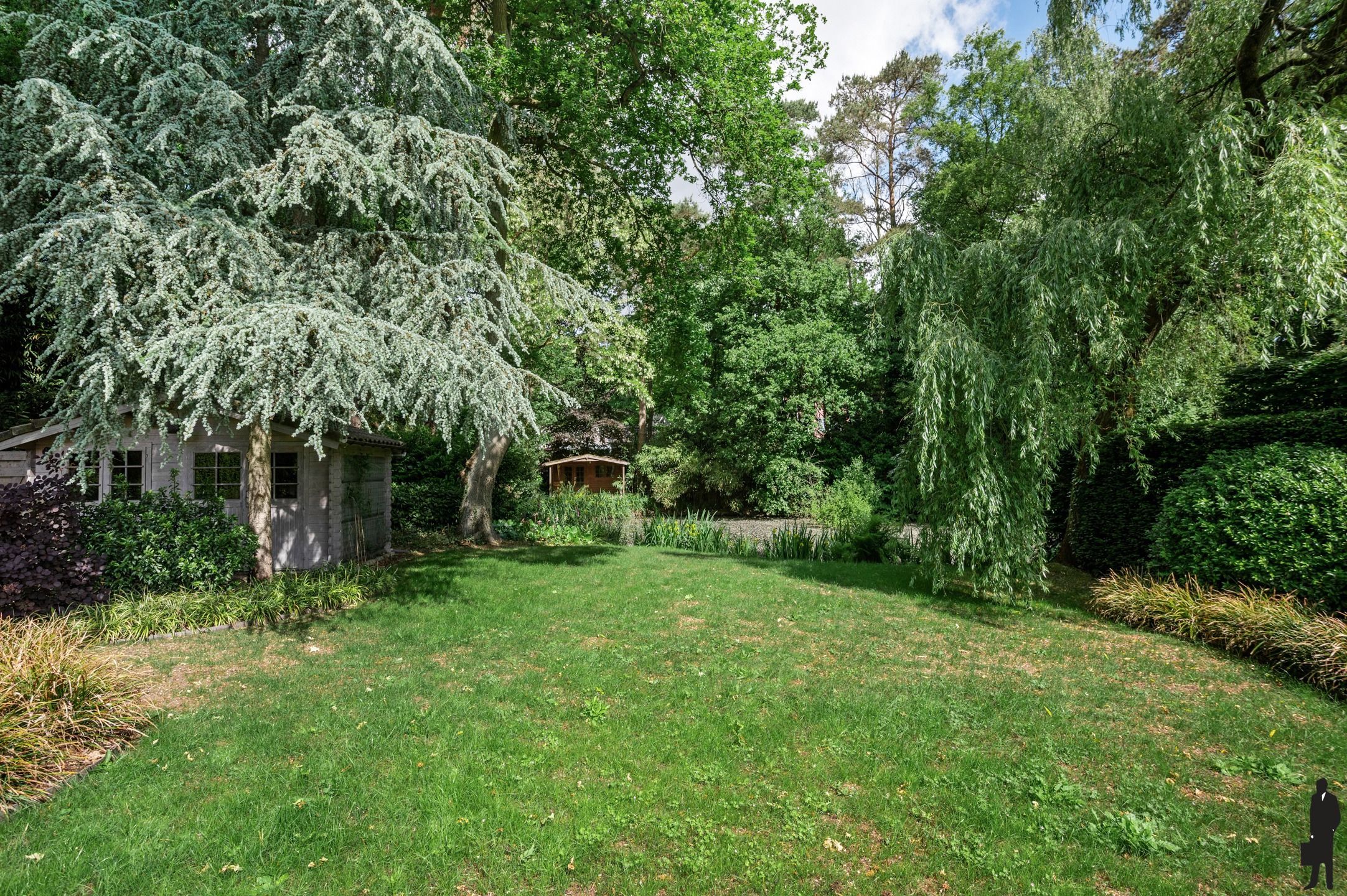 Stijlvol gerenoveerde villa met schitterende tuin en verwarmd zwembad foto 26