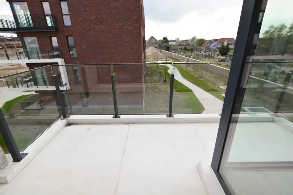 Modern, energiezuinig appartement met 2 slpks, terras, autostaanplaats en kelderberging. foto 10