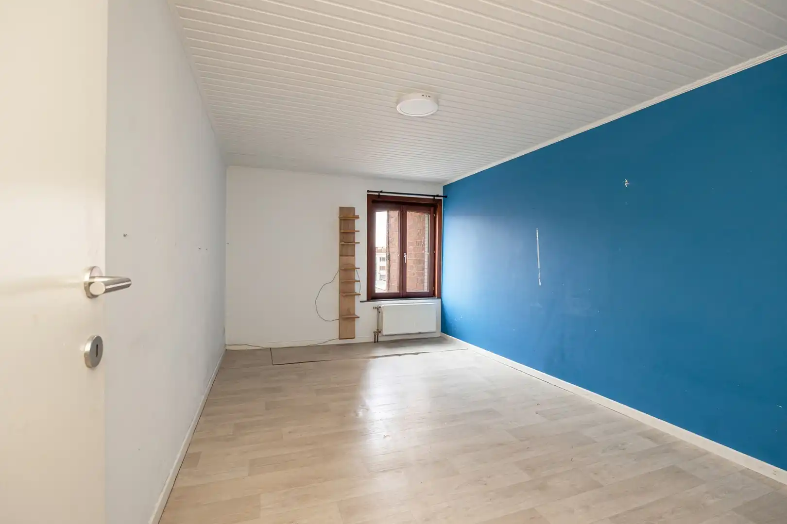 Handelsruimte met bovenliggend appartement foto 13