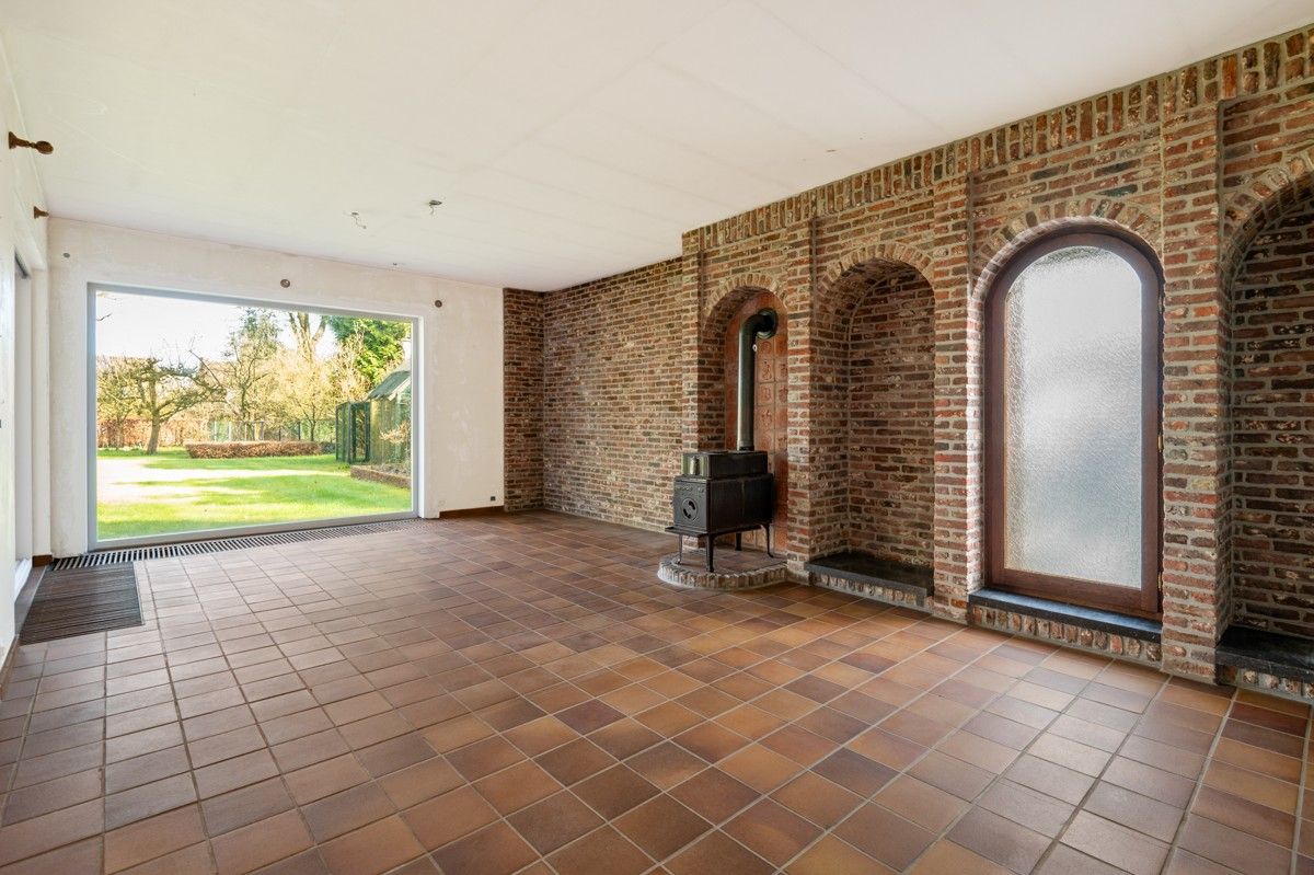 Charmant te renoveren woning op 2192m² aan de voet van het Zoerselbos. foto 7