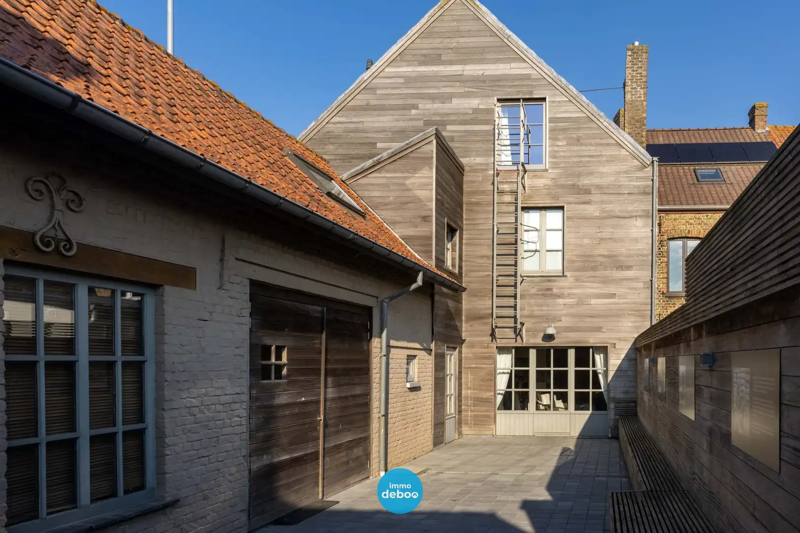 Uitzonderlijk ruime polyvalente woning met zuidgerichte tuin foto 5