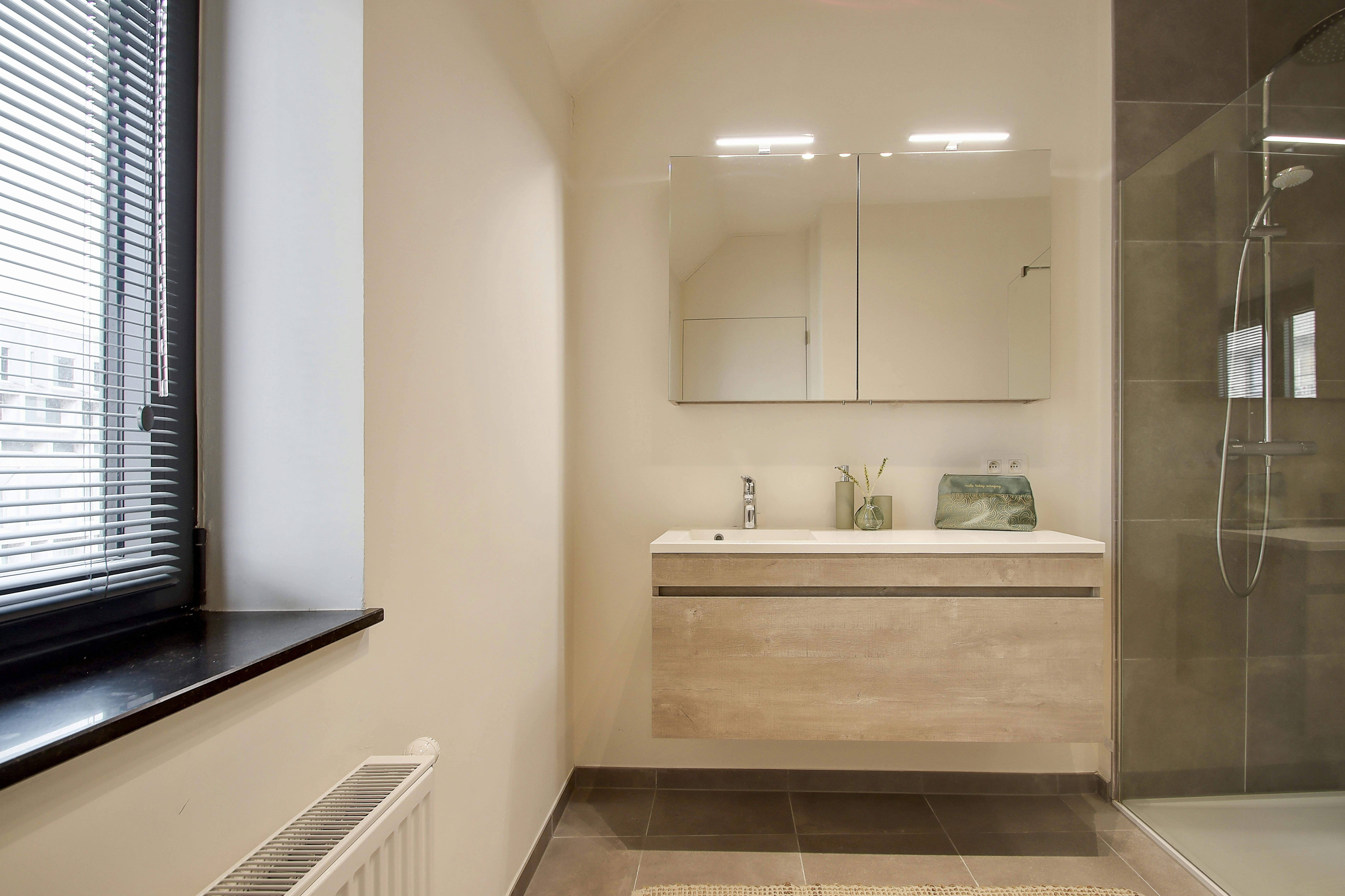 Ruim nieuwbouwappartement te koop in het centrum. foto 19