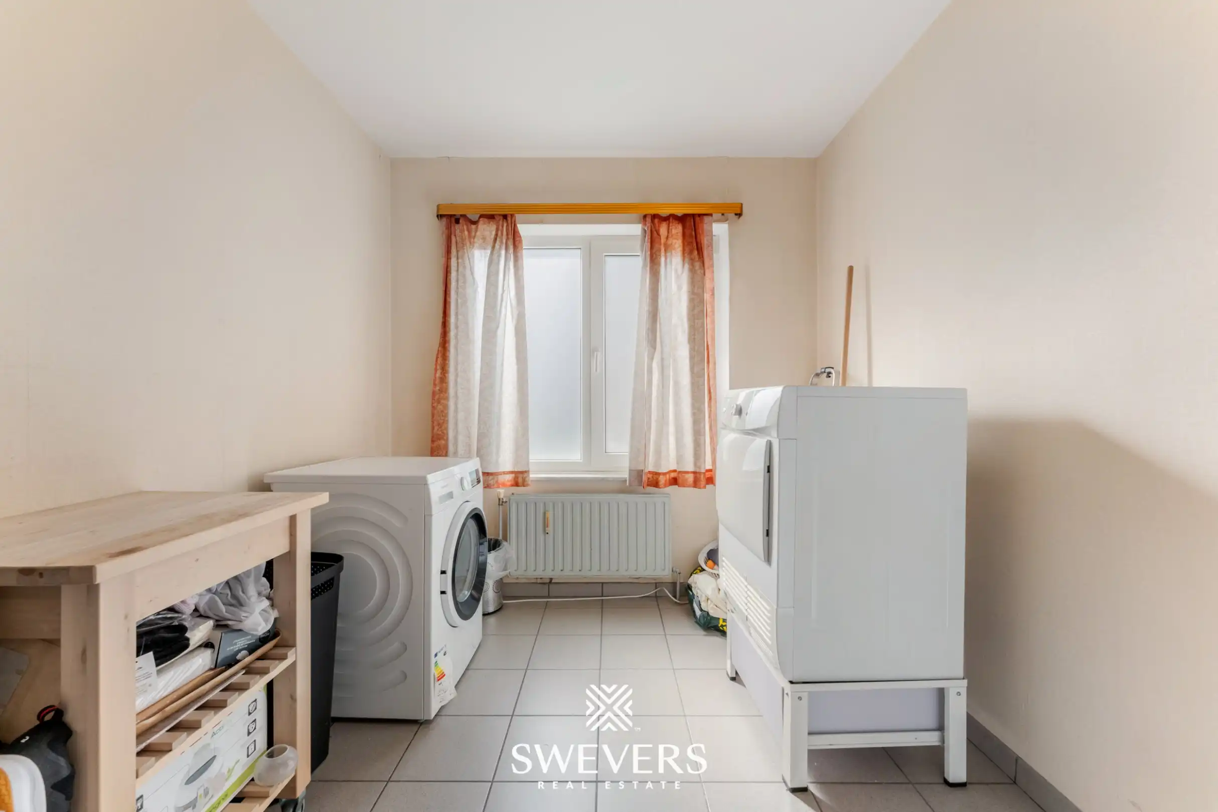 Ruim gelijkvloers 3-slaapkamerappartement inclusief autostaanplaats en kelderberging nabij Hasselt-centrum foto 14