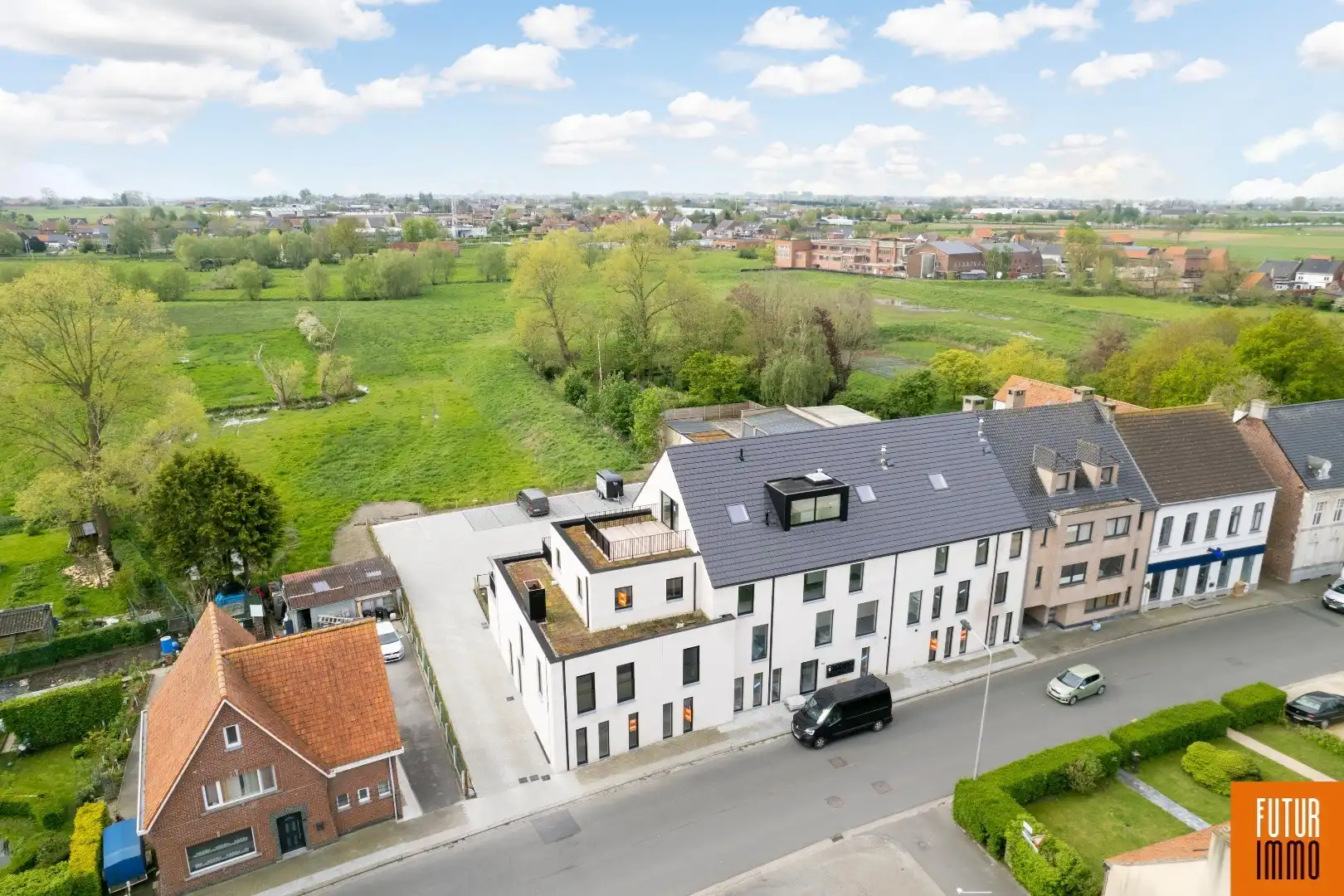 Dak appartement foto {{pictureIndex}}