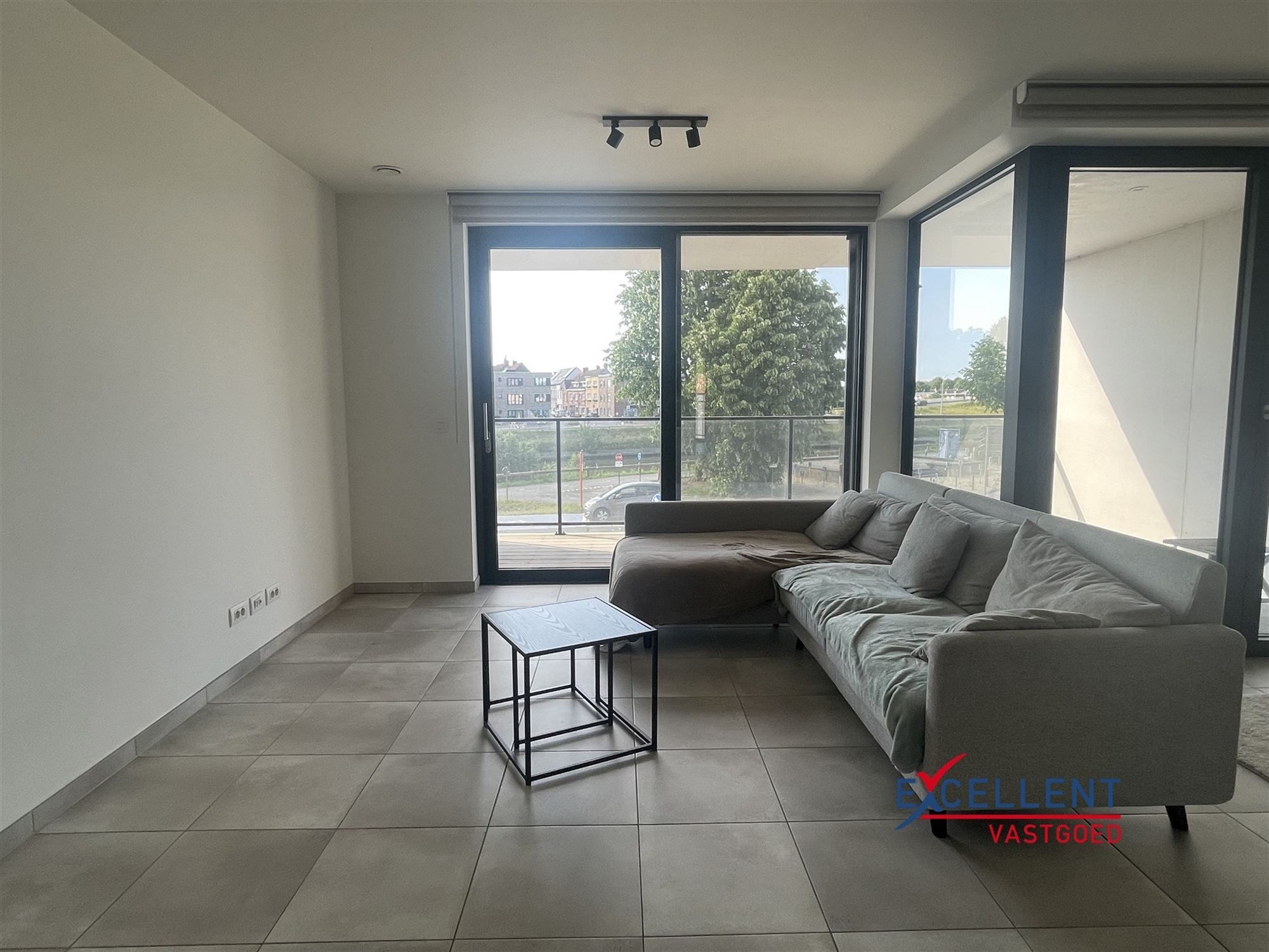 Nieuwbouwappartement centrum Deinze met twee slaapkamers te huur foto {{pictureIndex}}
