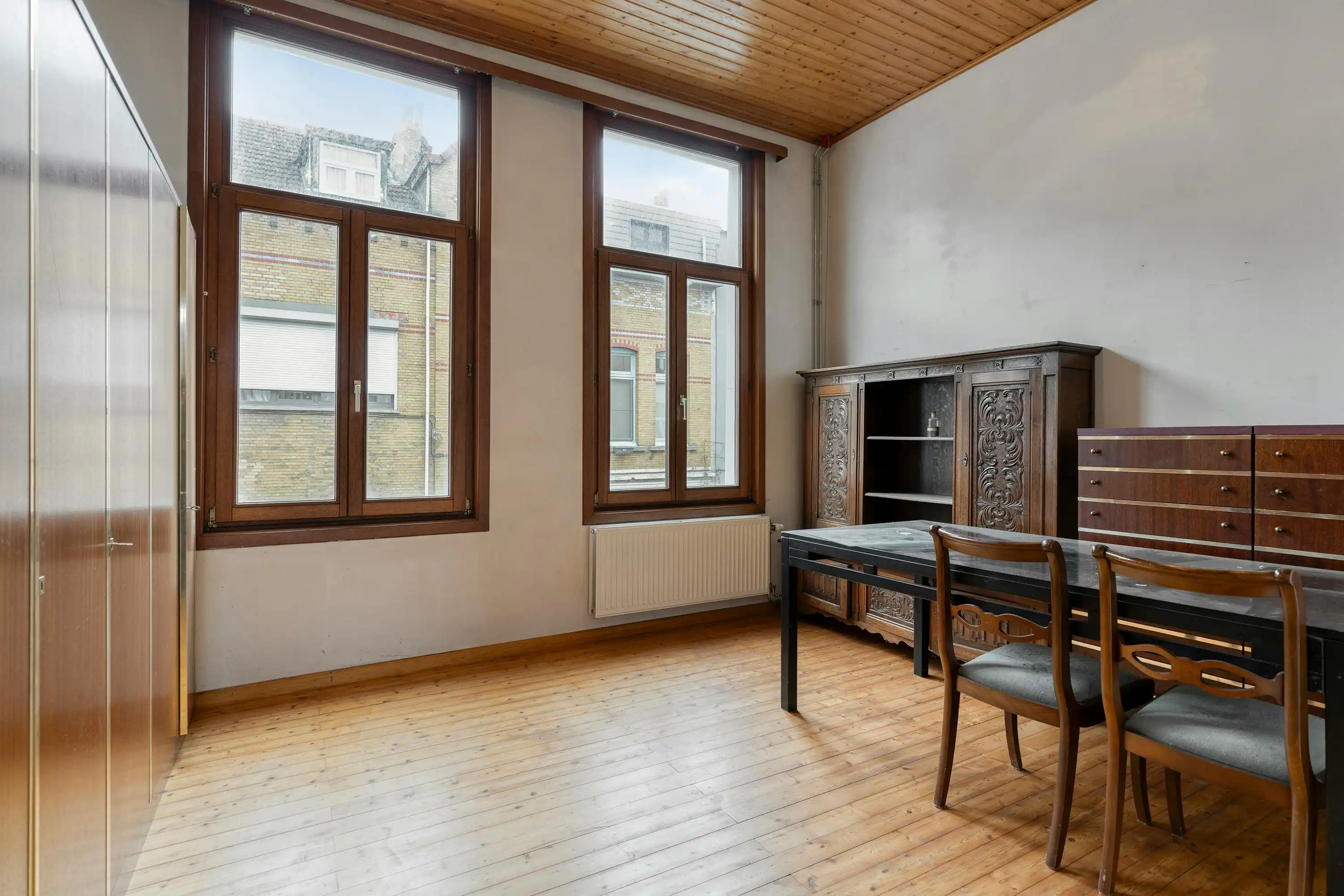 Op te frissen huis met 4 slaapkamers te koop in Borgerhout! foto 13