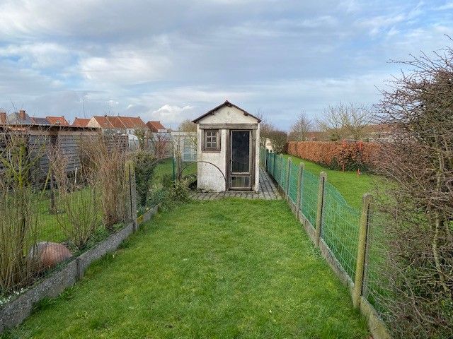 Te renoveren woning met 3 slaapkamers  en tuin. foto 2