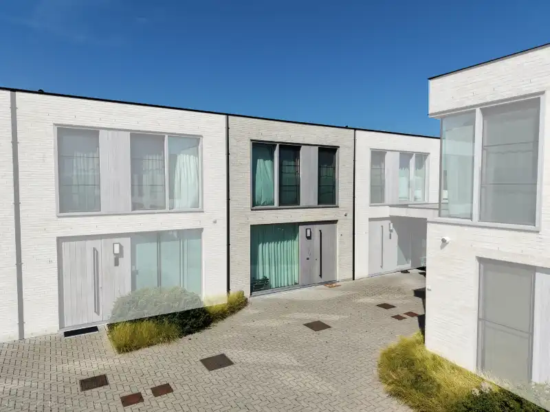 Energiezuinige woning met tijdloze architectuur in het charmante Oostduinkerke dorp! foto 2