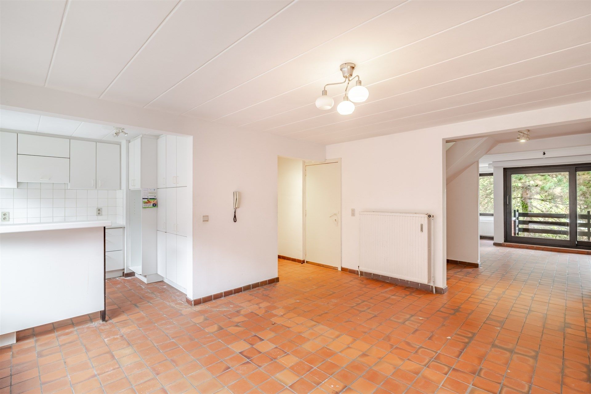 Opbrengsteigendom bestaande uit 4 appartementen + 22 garageboxen + magazijn/werkplaats foto 2