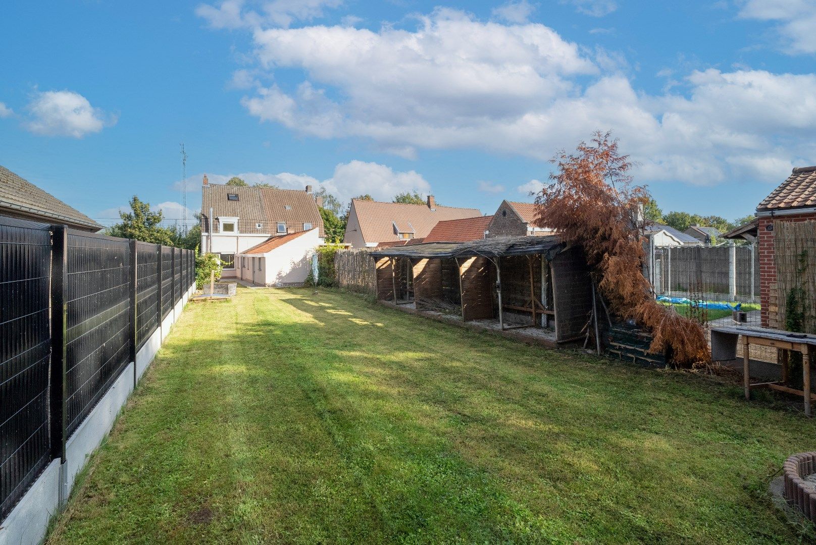 CHARMANTE WONING MET TUIN EN UITWEG foto 14