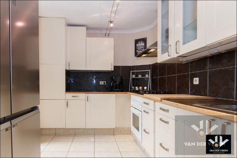 RUIME, VERZORGDE RIJWONING MET TOFFE STADSTUIN foto 5