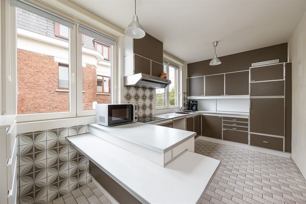 Woning vol potentieel met grote zonnige tuin foto 7