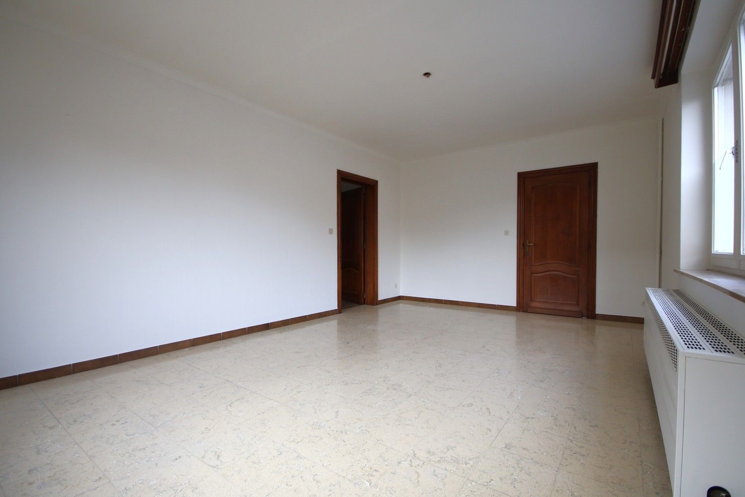 Ruime woning met 3 slaapkamers en tuin midden in het centrum foto 3