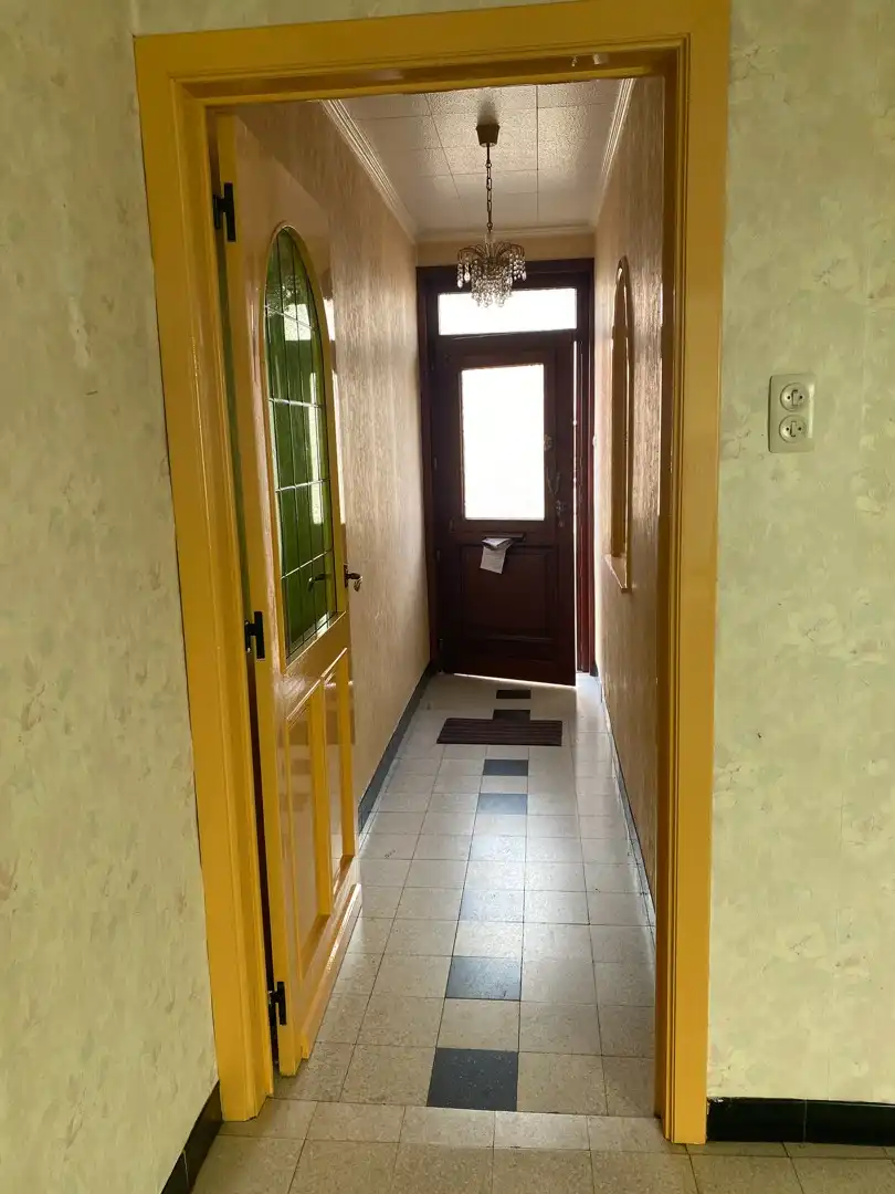 Te renoveren authentieke rijwoning met tuin en garage foto 2