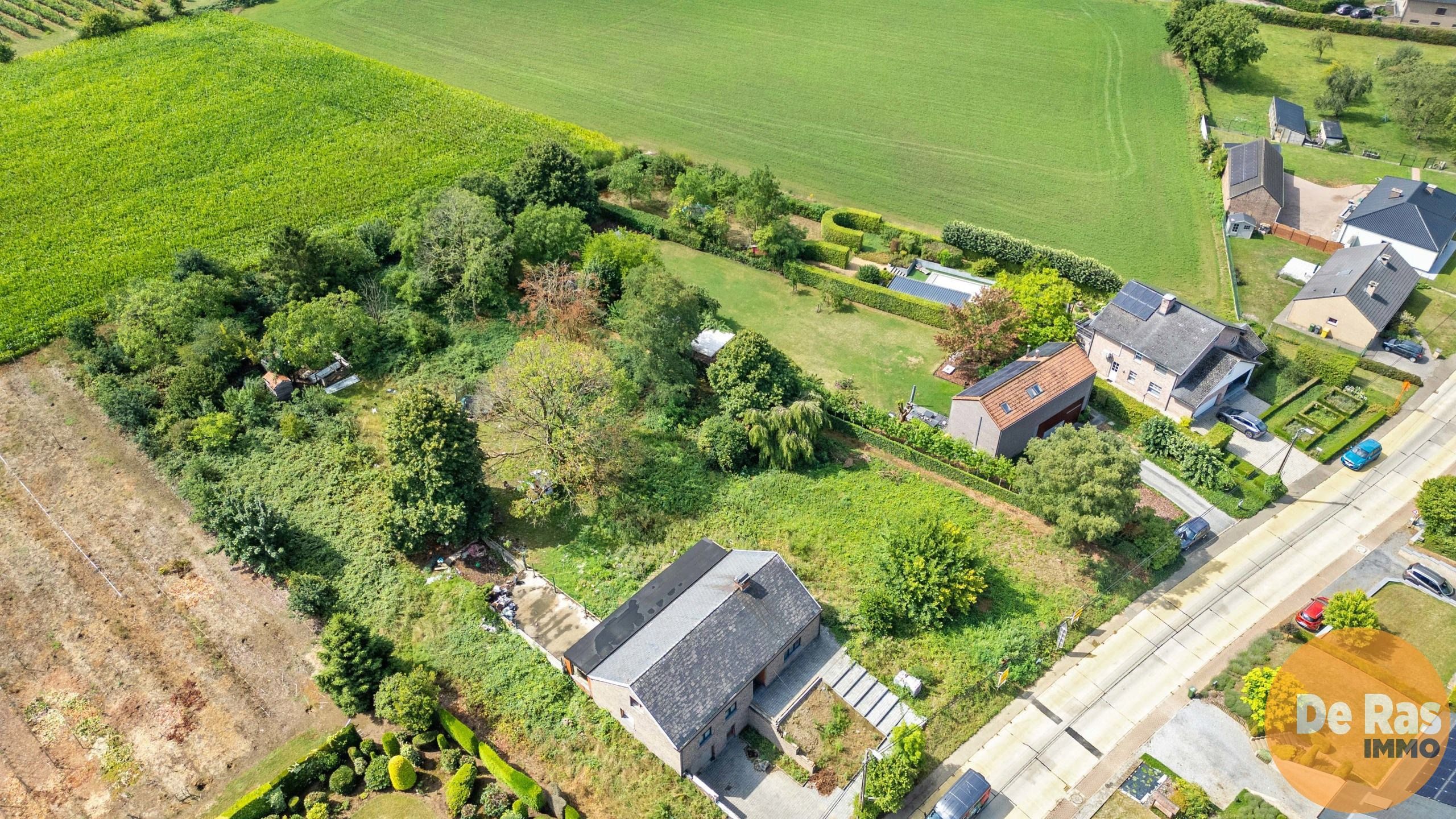 BEKKEVOORT - Zuidgerichte bouwgrond in groene omgeving foto 5