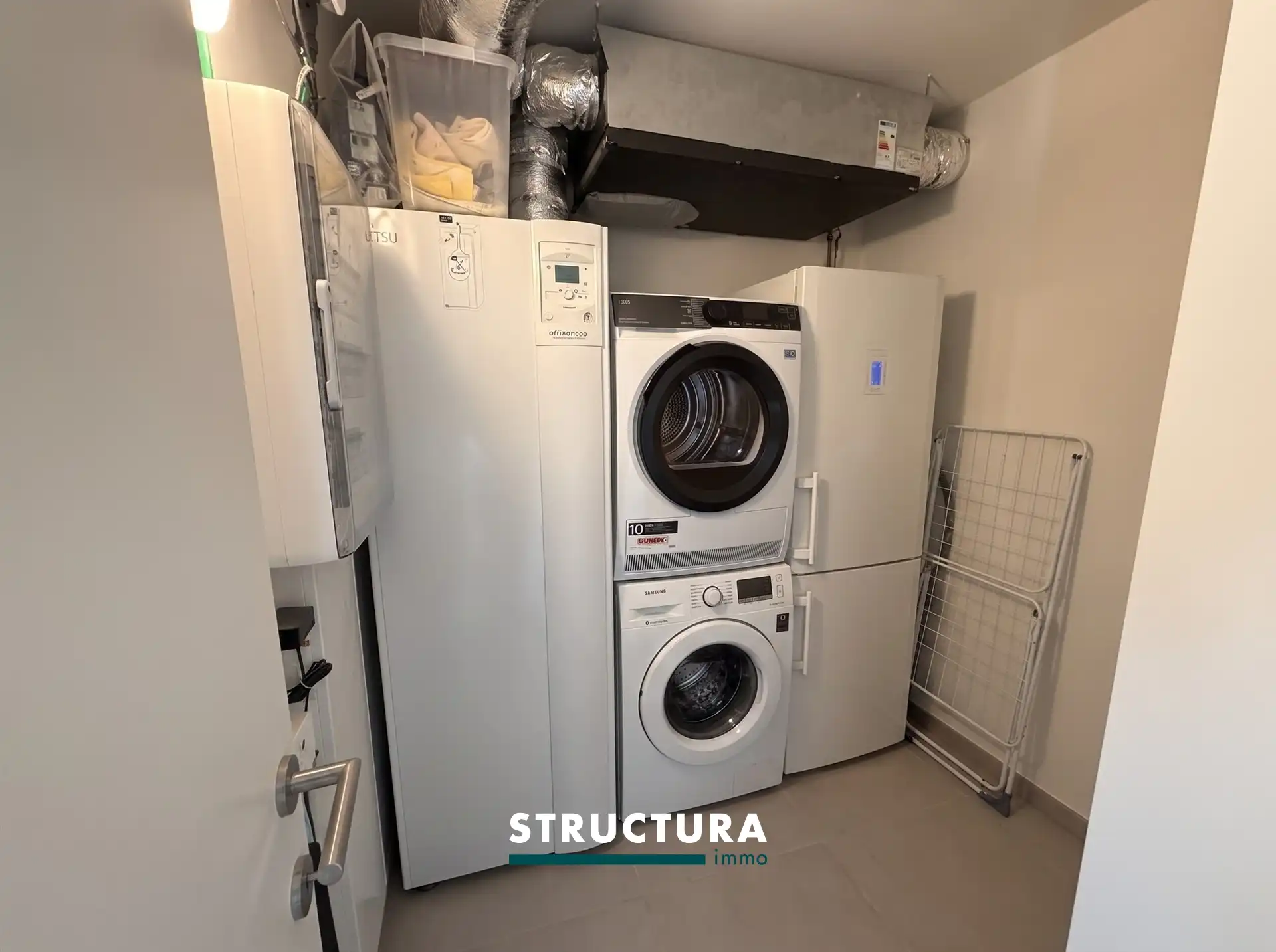 Appartement met 2 slaapkamers en 2 staanplaatsen in centrum Merchtem foto 4