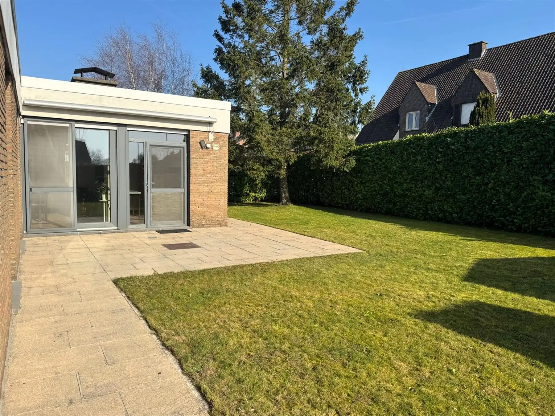 Gelijkvloerse woning met zonnige tuin in rustige woonbuurt foto 9