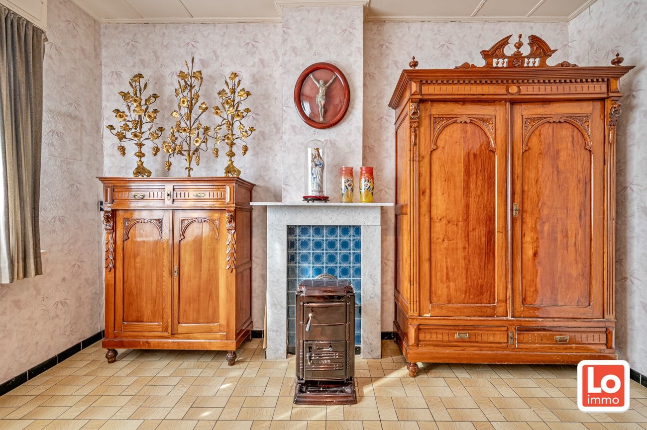 Landelijk gelegen halfopen afbraakwoning op groot perceel grond met open zicht in Zeveneken! foto 11