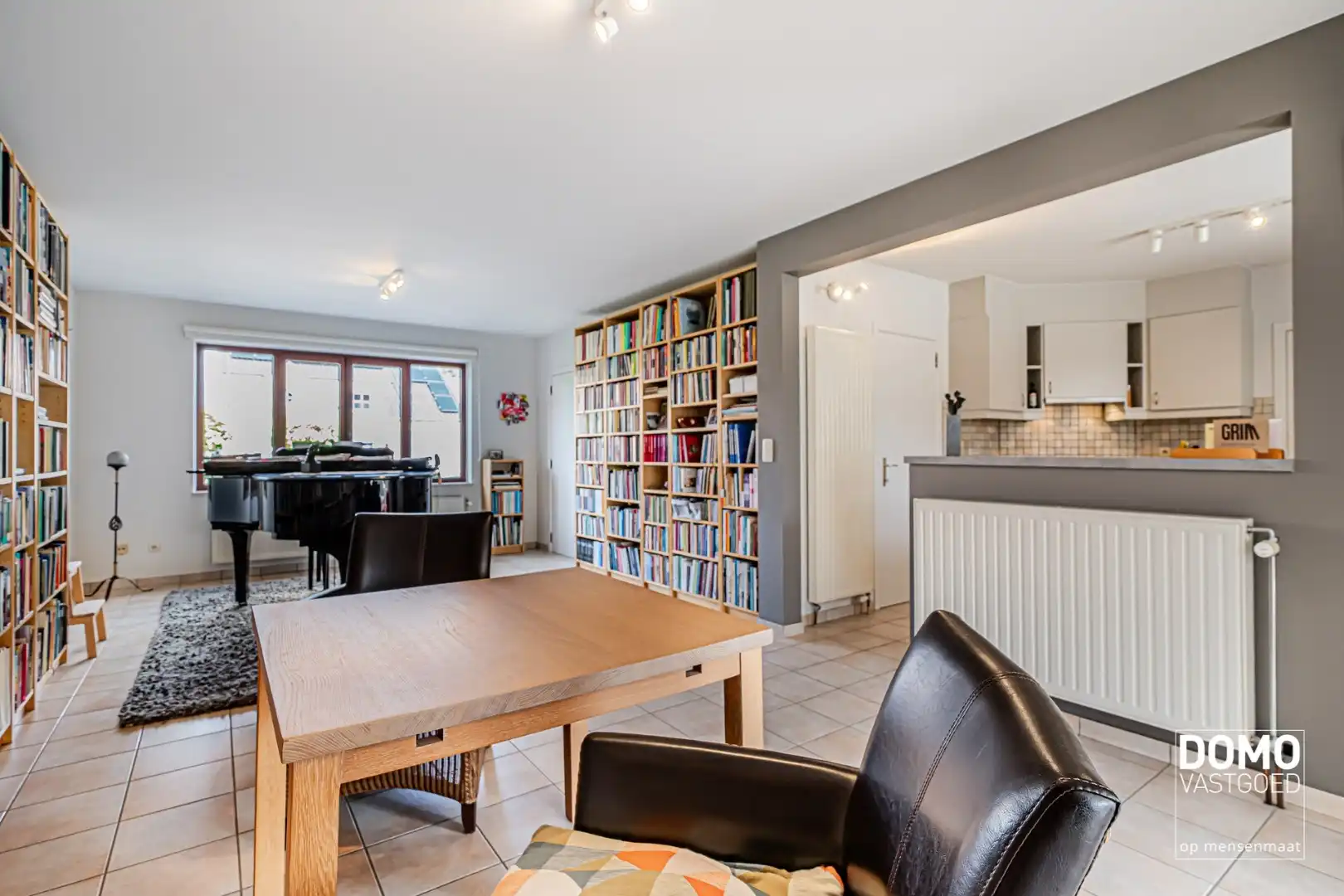 ZUIDWESTELIJK GEORIËNTEERDE DOORZONWONING MET LICHTRIJKE AANBOUW, GEZELLIGE TUIN EN RUIME GARAGE TE KURINGEN (HASSELT)  foto 7