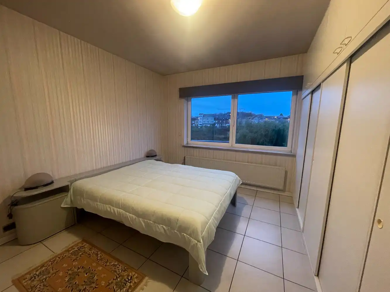 Gunstig gelegen woning met groot terras/tuin + een inpandige én een aparte garage foto 17