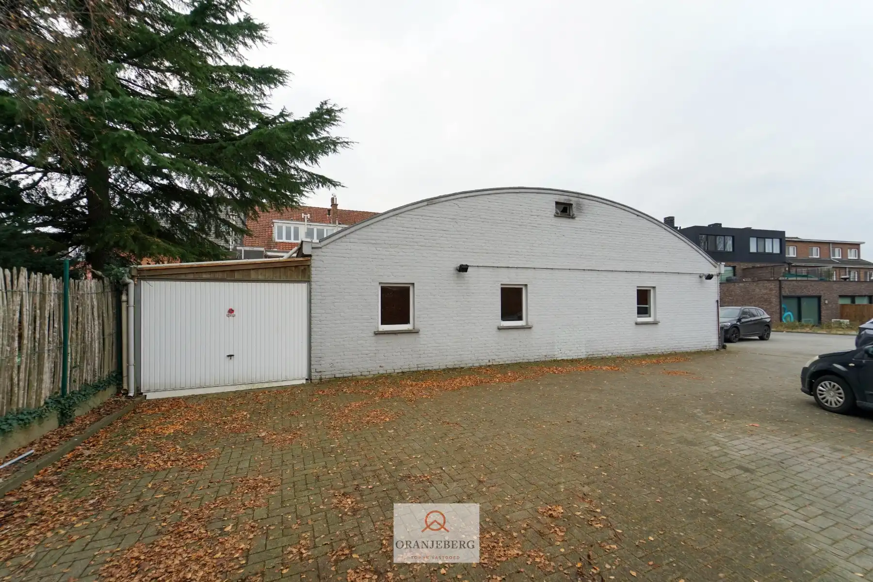 Ruim handelspand met meerdere ruimtes en parking te huur in centrum Drongen foto 13