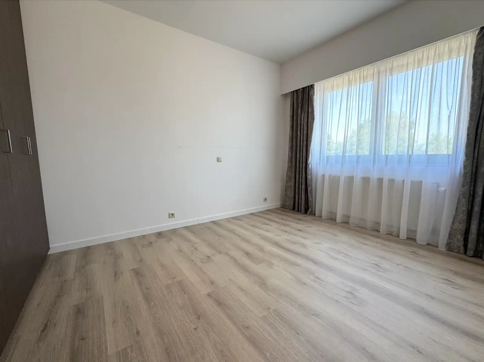 Instapklaar appartement met 2 slaapkamers én garage! foto 15